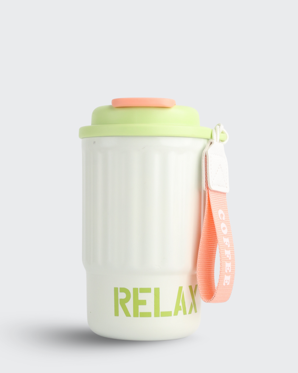 White cup with green lid and handle, featuring the word 'RELAX' on a white background.