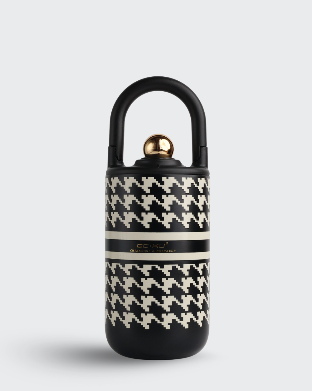 Black and white patterned lock with gold accents on a light gray background