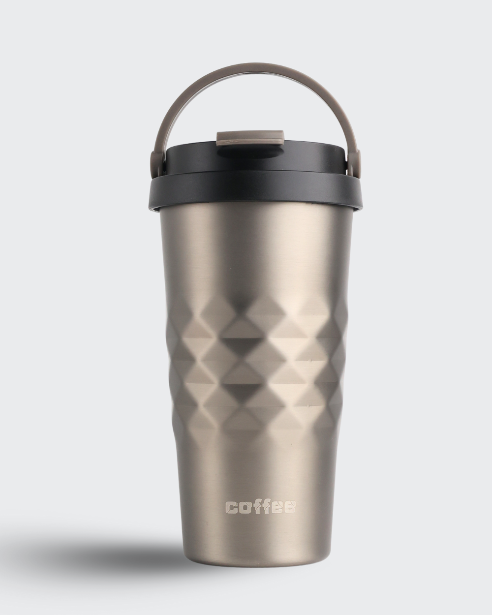 Stainless steel travel mug with diamond pattern on a light gray background