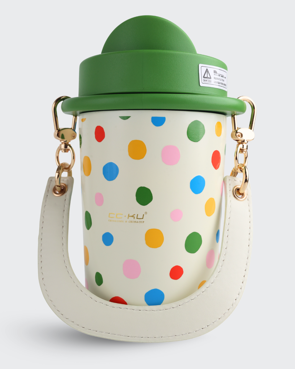 Colorful polka dot water bottle with green lid on a white background