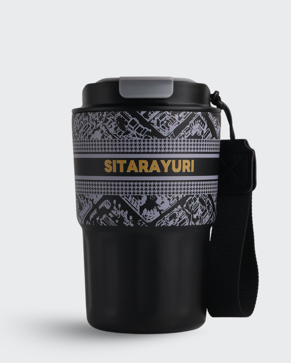 Black travel mug with patterned sleeve and 'Sitarayuri' branding on a light gray background