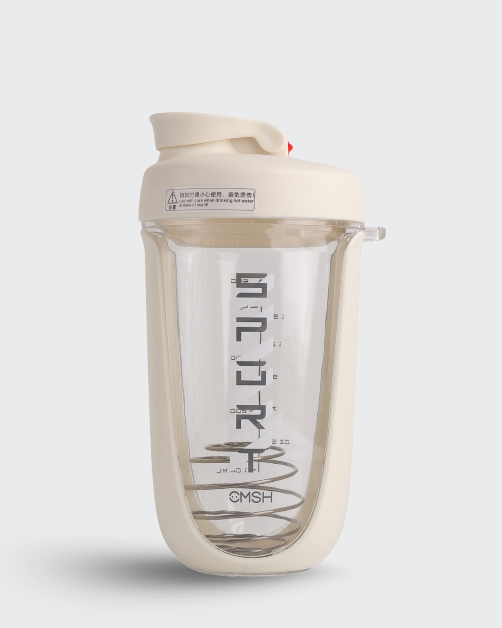 Clear shaker bottle with beige lid on a white background